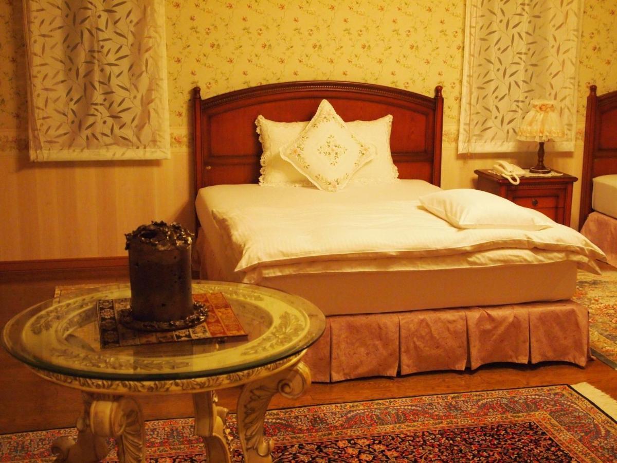 Petit Hotel Corinthian Rebun Værelse billede