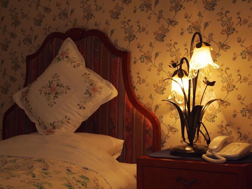 Petit Hotel Corinthian Rebun Værelse billede