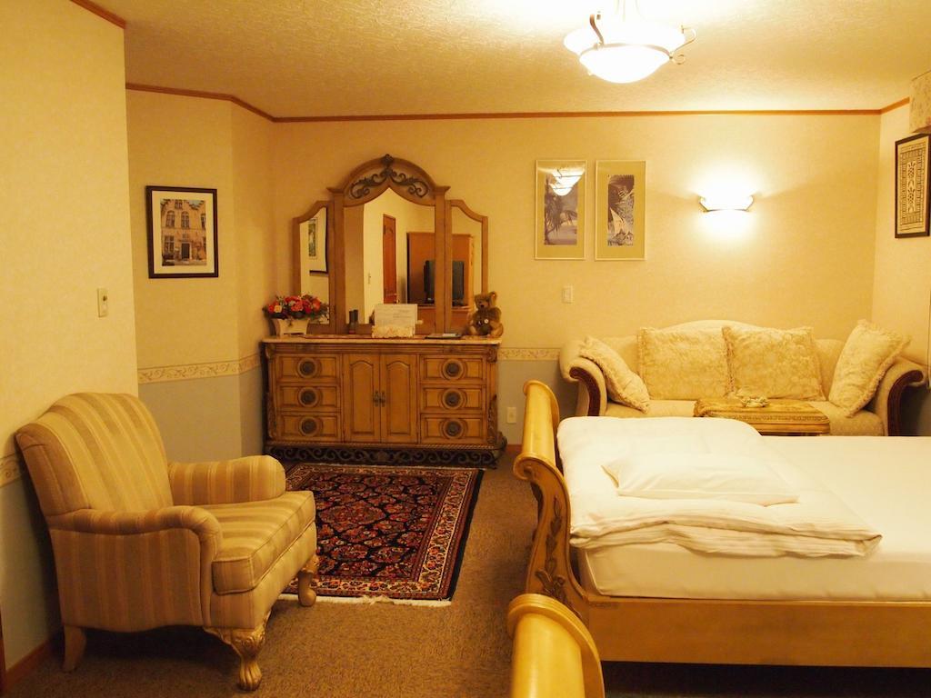Petit Hotel Corinthian Rebun Værelse billede