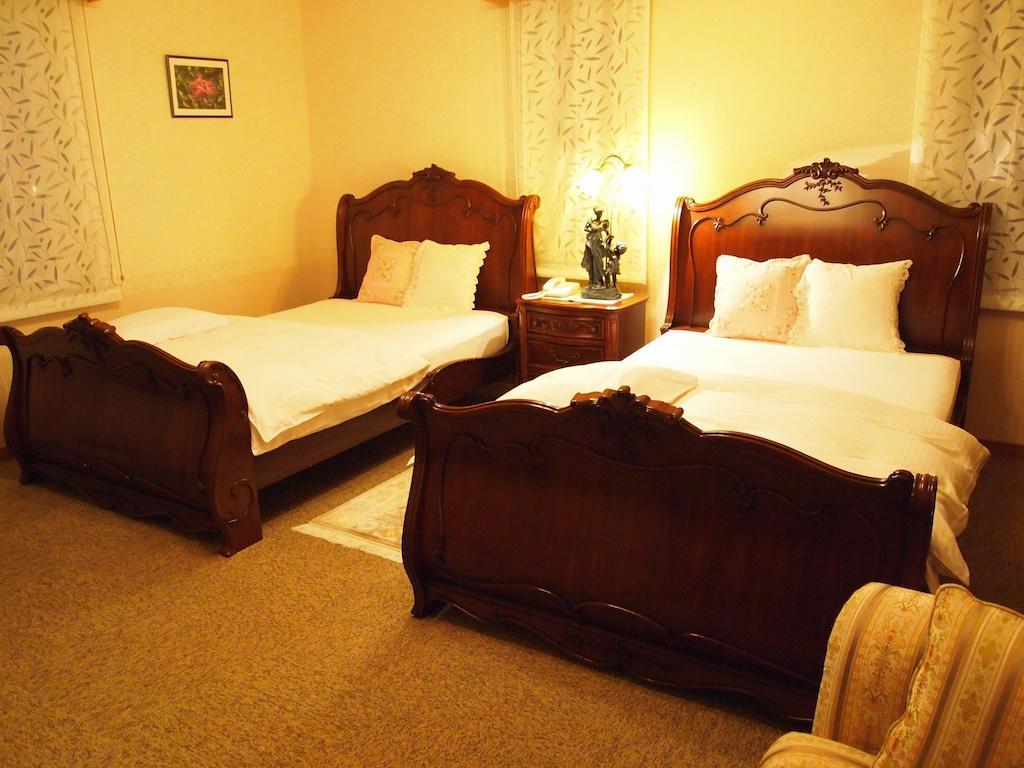 Petit Hotel Corinthian Rebun Værelse billede