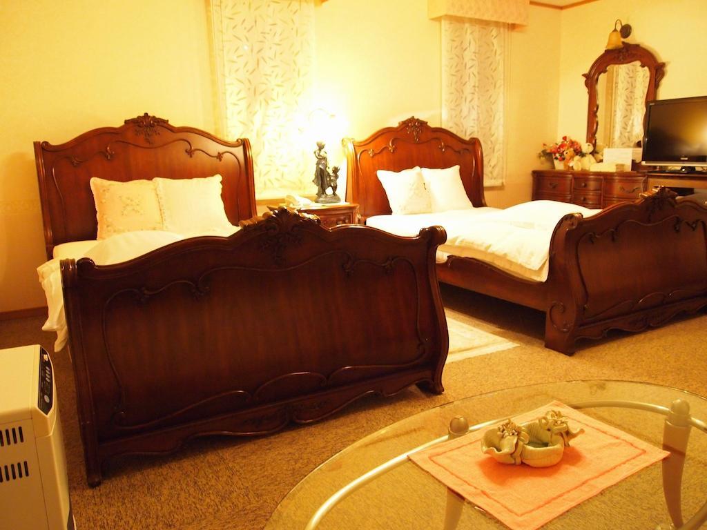 Petit Hotel Corinthian Rebun Værelse billede