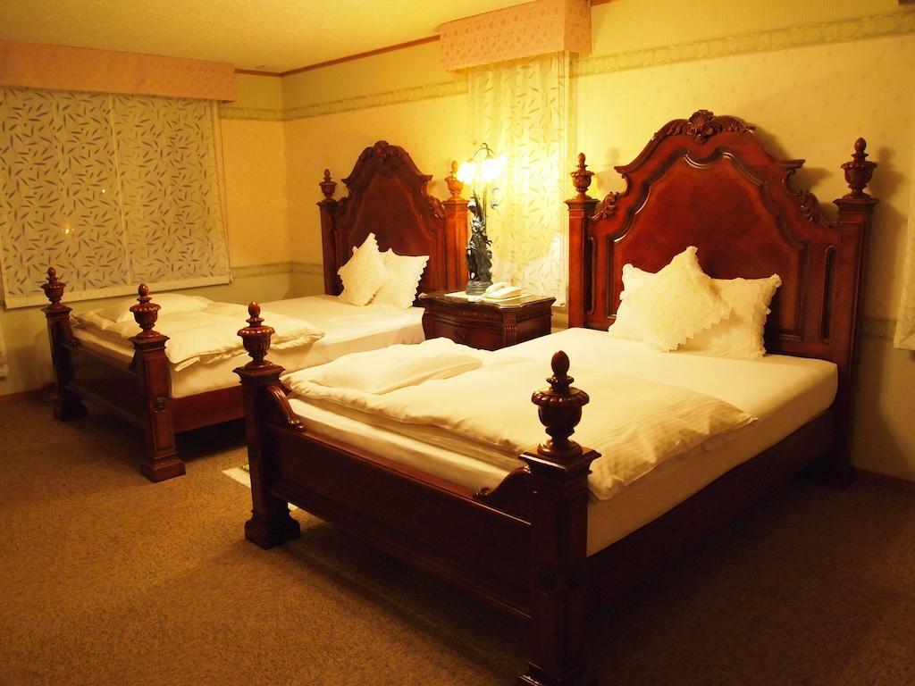 Petit Hotel Corinthian Rebun Værelse billede