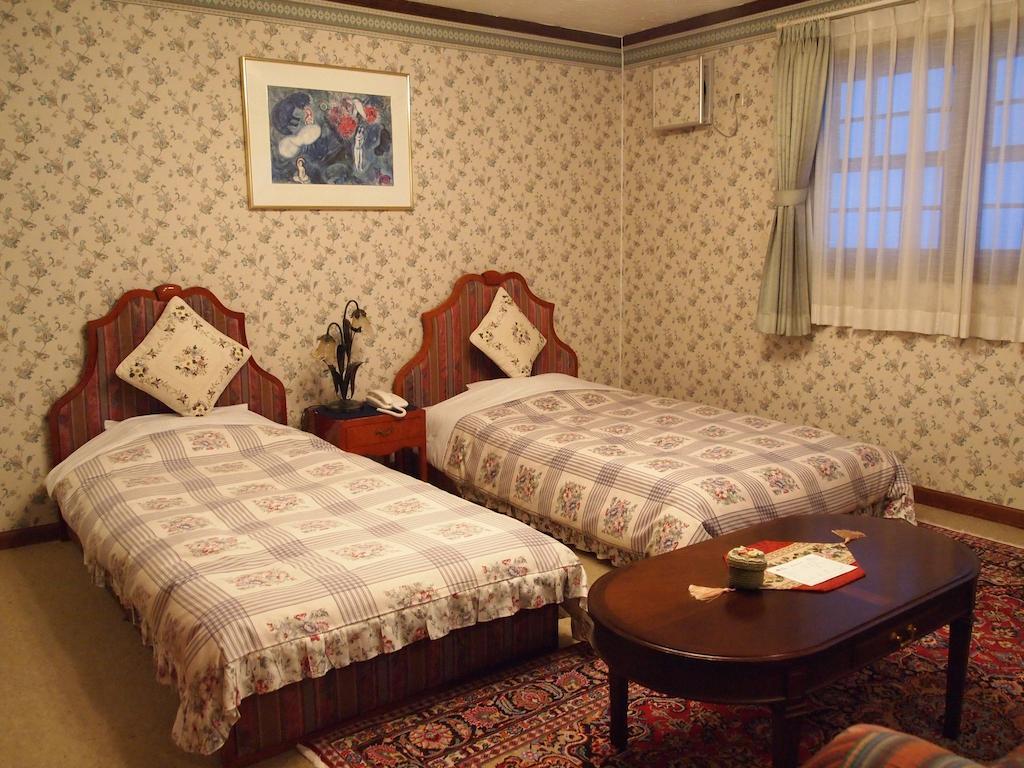 Petit Hotel Corinthian Rebun Værelse billede