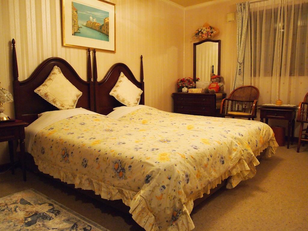 Petit Hotel Corinthian Rebun Værelse billede
